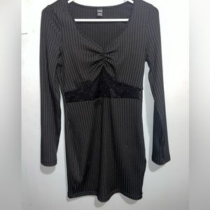 Black sheik lace cutout dress. Size MEDIUM PETITE